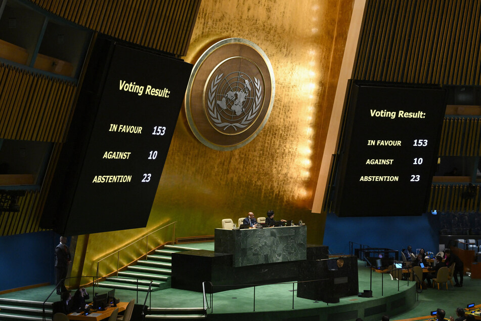 The voting results during a United Nations General Assembly meeting vote on a resolution demanding "an immediate humanitarian ceasefire" in Gaza at the UN headquarters in New York.