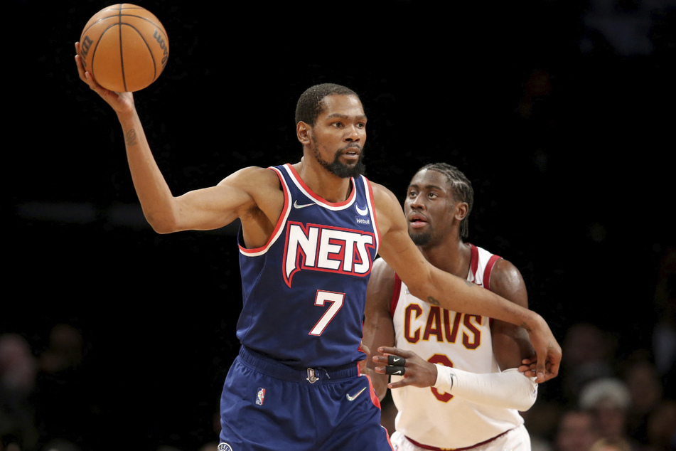 Brooklyn Nets forward Kevin Durant (l.) controlled the ball against Cleveland Cavaliers guard Caris LeVert (r.) during the second quarter at the Barclays Center on Friday. (Brad Penner - USA TODAY Sports)