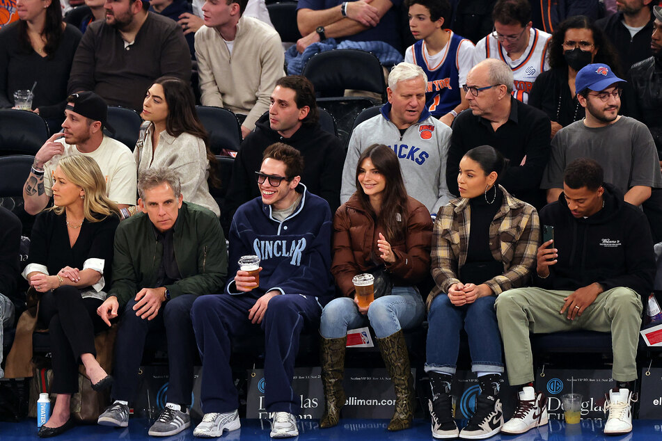 Emily Ratajkowski (center r) and Pete Davidson (center l) were seen getting flirty at a New York Knicks Game in November before they split.