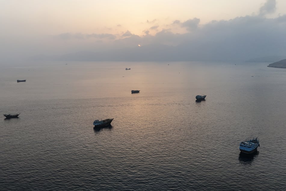 This aerial photograph shows boats anchored off Oman’s northern Musandam Peninsula near the Strait of Hormuz on Saturday.