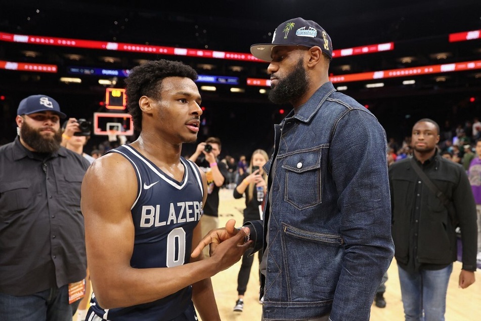 Per the NBA world, fans believe that if LeBron James (front r) does retire this offseason, he will un-retire once son Bronny (front l) heads to the big league.