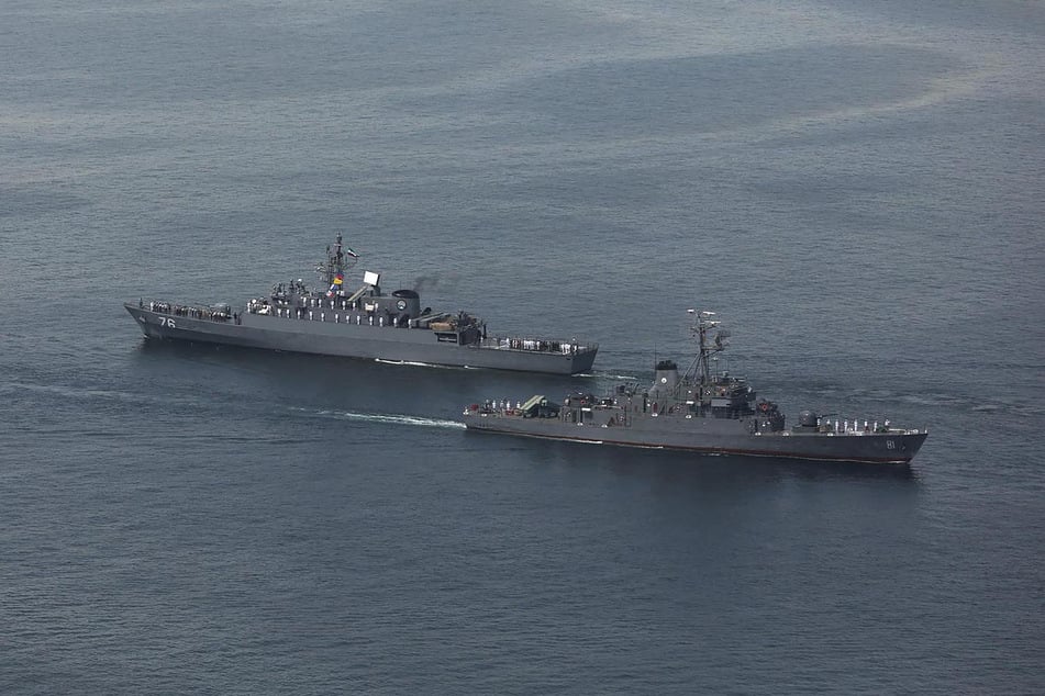 This handout photo made available by the Iranian Army Office on March 12, 2025 shows navy vessels taking part in a joint Iranian-Russian-Chinese military drill in the Gulf of Oman.