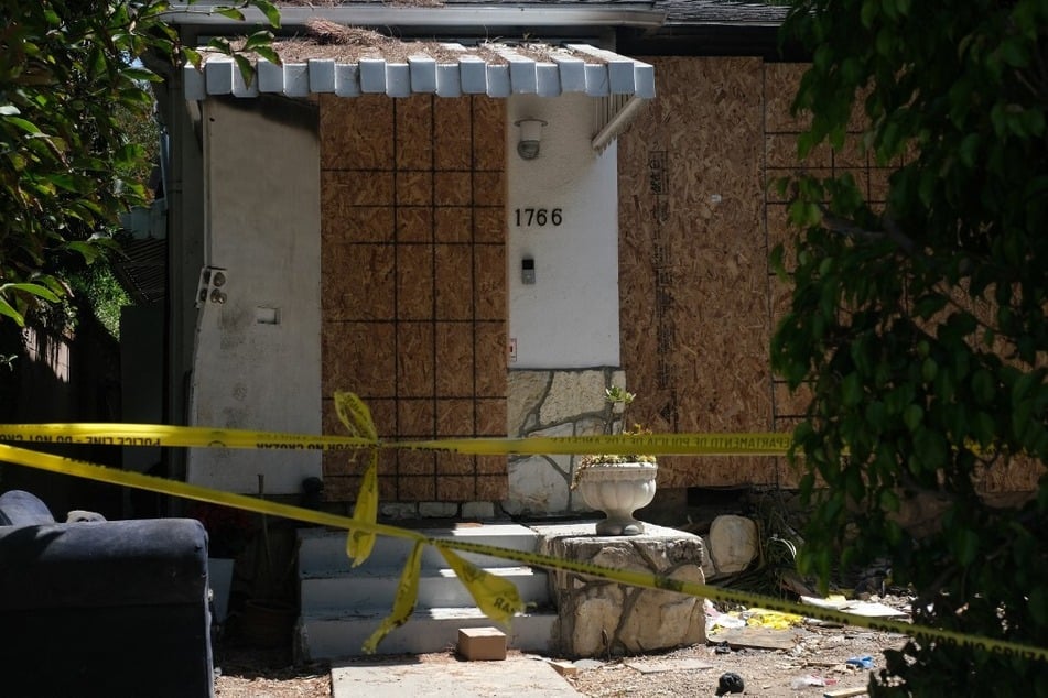 Caution tape is seen at the site where US actress Anne Heche crashed into a home in Mar Vista, California