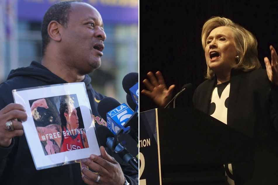 Political activist Najee Ali (l.) shows a picture of WNBA star Brittney Griner, whose release Hillary Clinton is also advocating for.