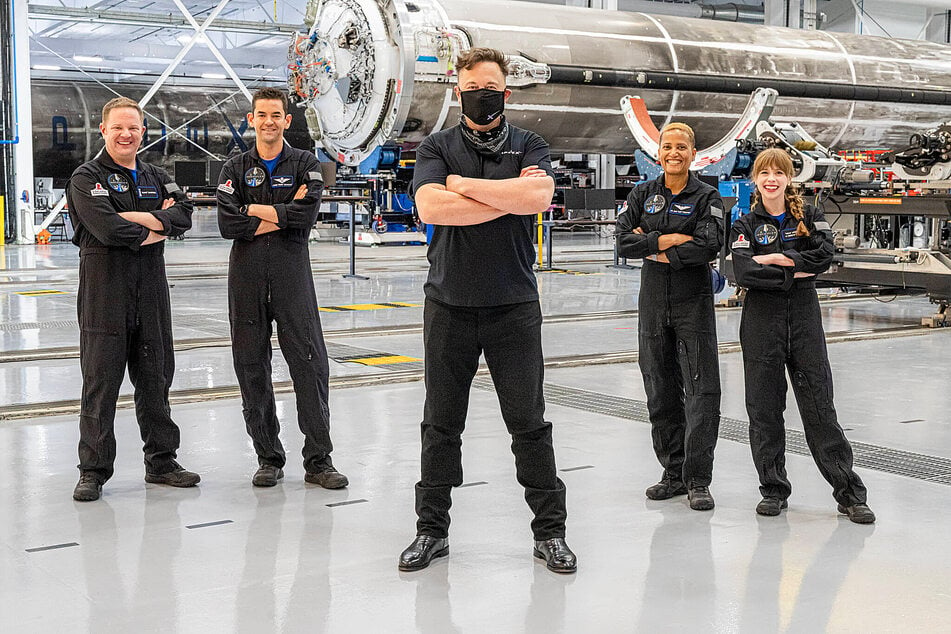 Elon Musk with the world s first all-civilian mission to orbit in September 2021. From left to right, the crew: Chris Sembroski, Jared Isaacman, Dr. Sian Proctor, and Hayley Arceneaux.