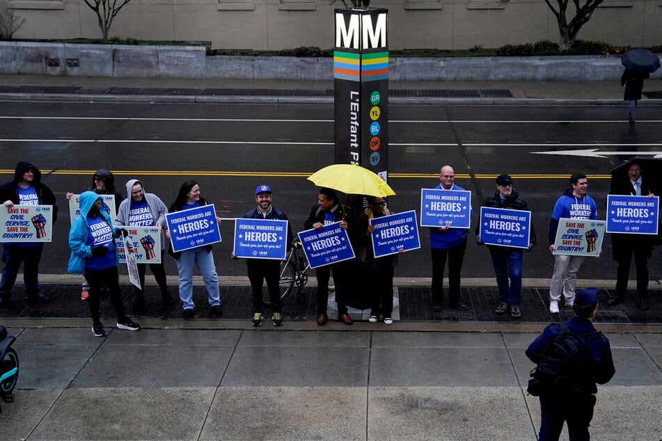 Federal workers have been threatened with "mass firings" by the Trump administration if Democrats did not capitulate to its demands.
