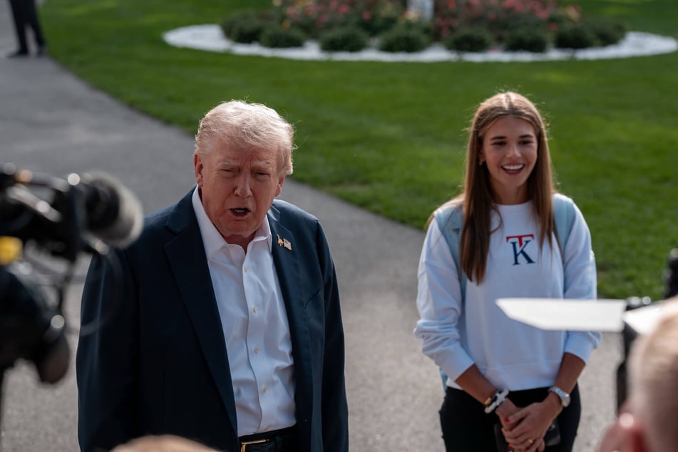 President Donald Trump (l.) was criticized by California Governor Gavin Newsom for taking golf trips during a government shutdown.
