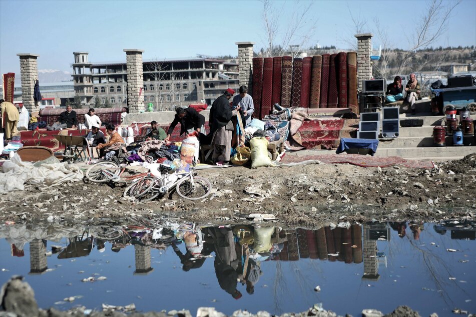 Afghanistan's economy is crumbling as the country suffers under US-imposed sanctions.