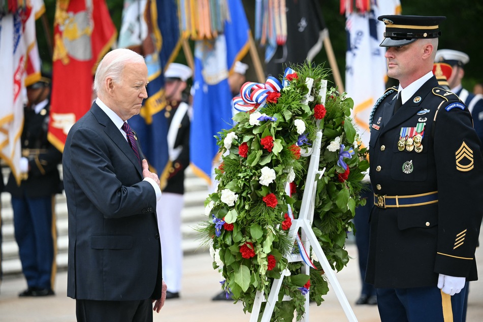 President Joe Biden participates in a wreath-laying ceremony at the Tomb of the Unknown Soldier at Arlington National Cemetery in observance of Memorial Day on Monday in Arlington, Virginia.