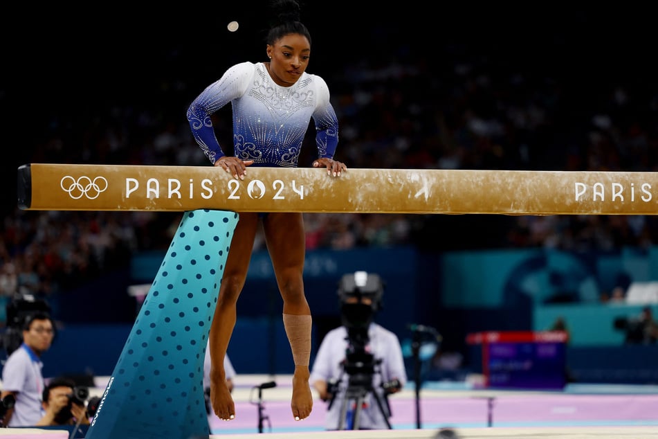 Biles slipped off the balance beam during her routine on a day when several gymnasts struggled with the apparatus.