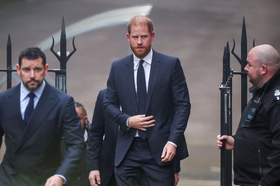 Prince Harry (c.) could testify in court as early as Wednesday.