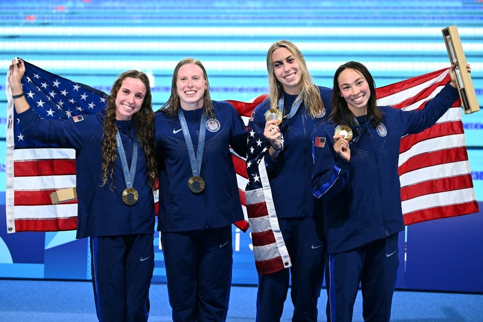 Gold medallists team USA – (L-R) Regan Smith, Lilly King, Gretchen Walsh, and Torri Huske – pose after women's 4x100m medley relay swimming event during the Paris 2024 Olympic Games at the Paris La Defense Arena in Nanterre, west of Paris, on Sunday.