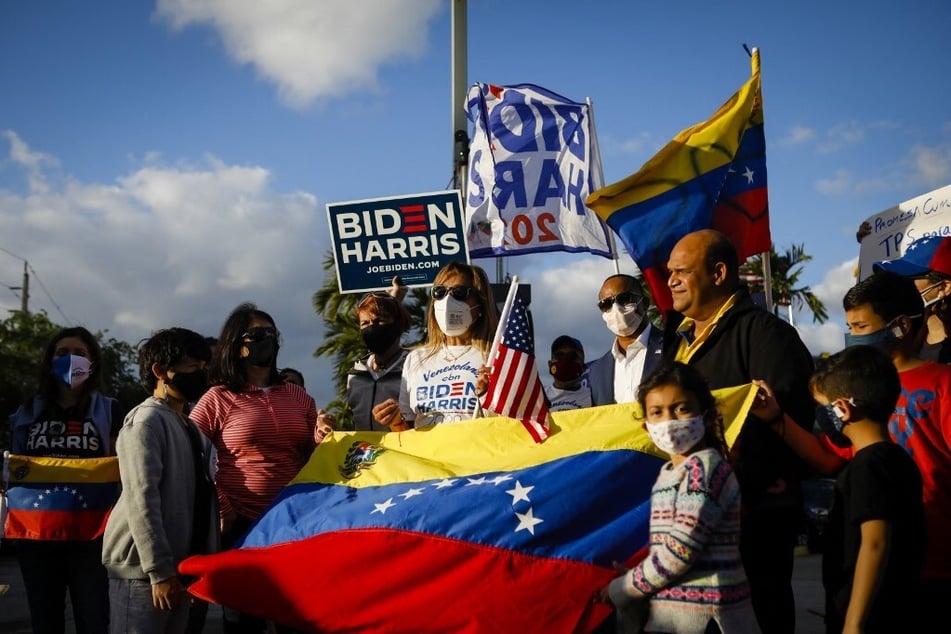 Venezuelan immigrants in Miami, Florida, celebrate the Biden administration's extension of Temporary Protected Status for nationals of the country.