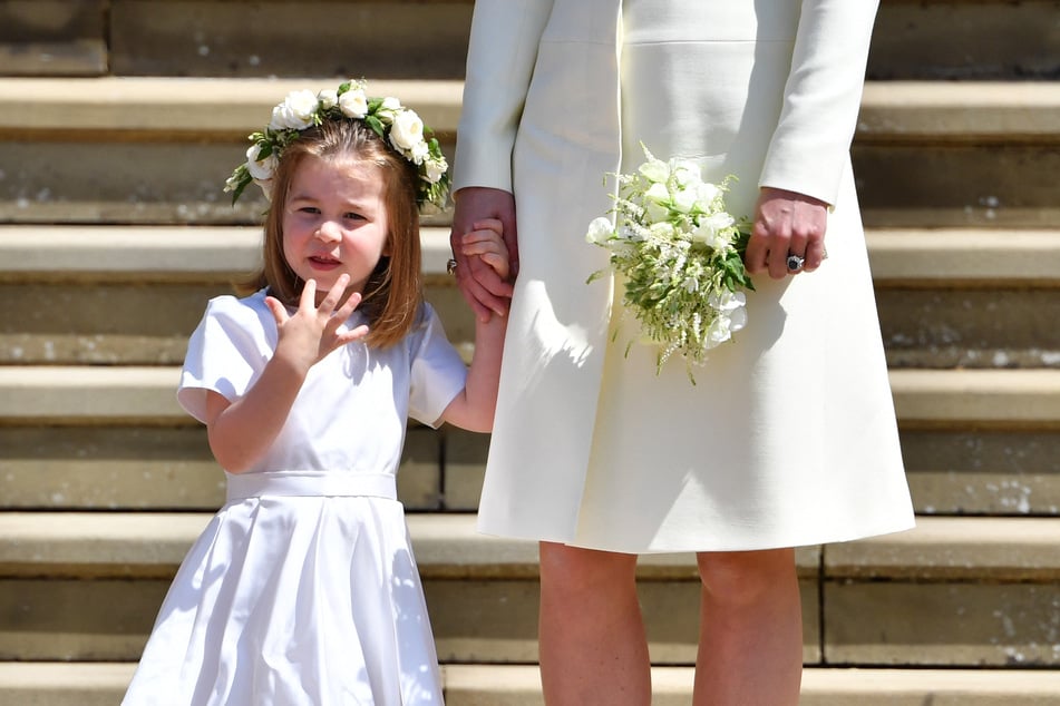 Princess Charlotte's flower girl dress is said to be the cause of the spat between the sisters-in-law.