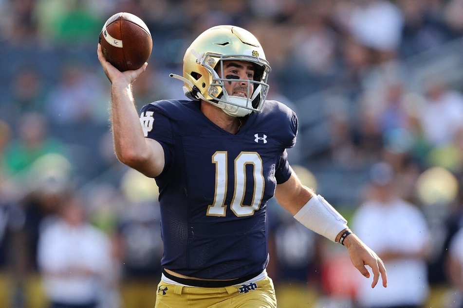 Drew Pyne #10 of the Notre Dame Fighting Irish in action against the Marshall Thundering Herd during the second half at Notre Dame Stadium.