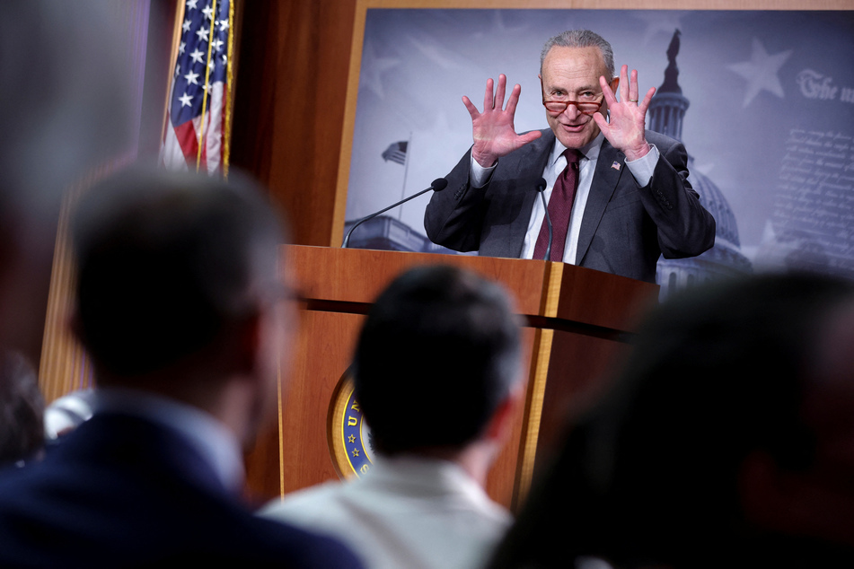 Senate Majority Leader Chuck Schumer speaks at a press conference after the Senate passage of the spending package.