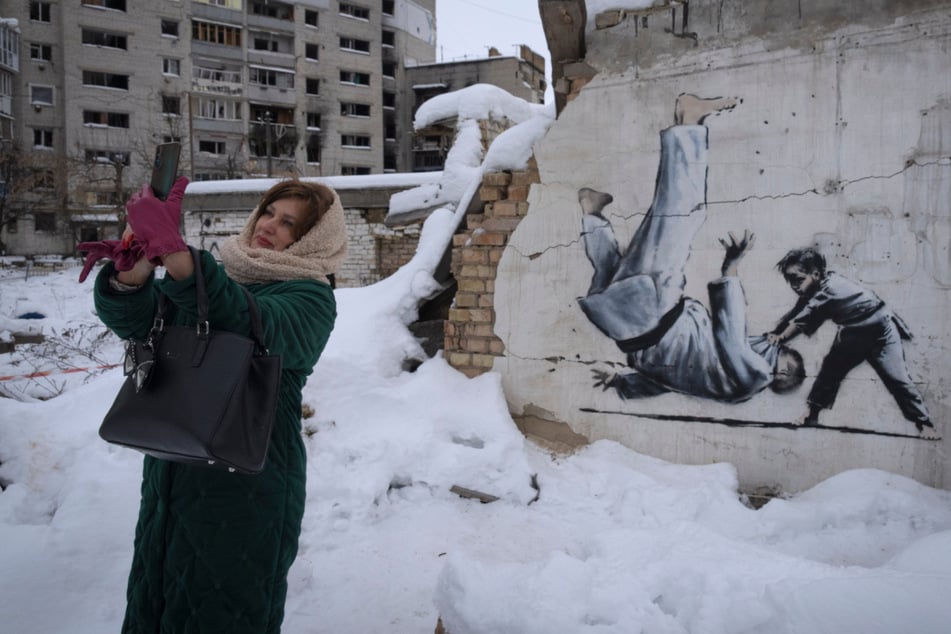 Mitten im Kriegsgebiet: Frau plaudert mit Banksy - ohne zu wissen, dass er es ist!
