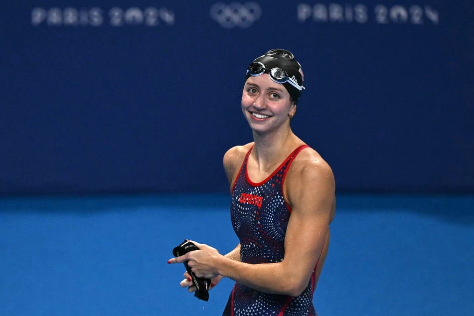 US' Kate Douglass celebrates after winning the final of the women's 200m breaststroke swimming event during the Paris 2024 Olympic Games at the Paris La Defense Arena in Nanterre, west of Paris, on August 1, 2024.