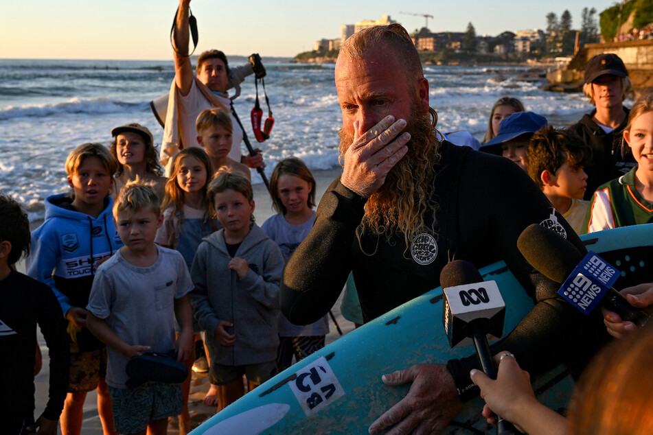 Australian blows world record for longest surfing session out of the water!