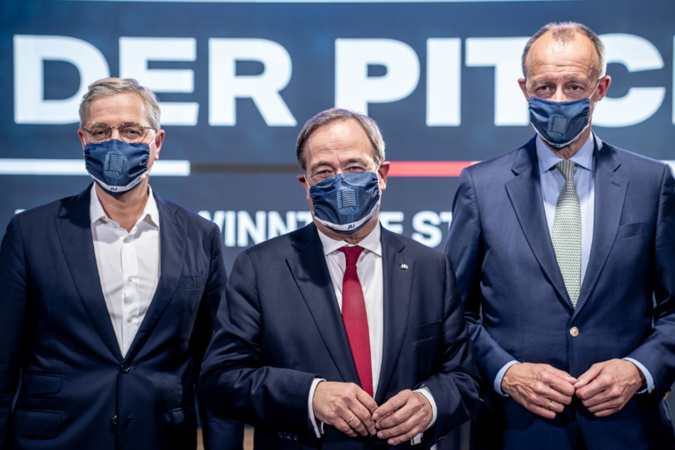 Norbert Röttgen (l.-r.), Armin Laschet und Friedrich Merz. Die drei Kandidaten für den CDU-Vorsitz stehen nebeneinander.