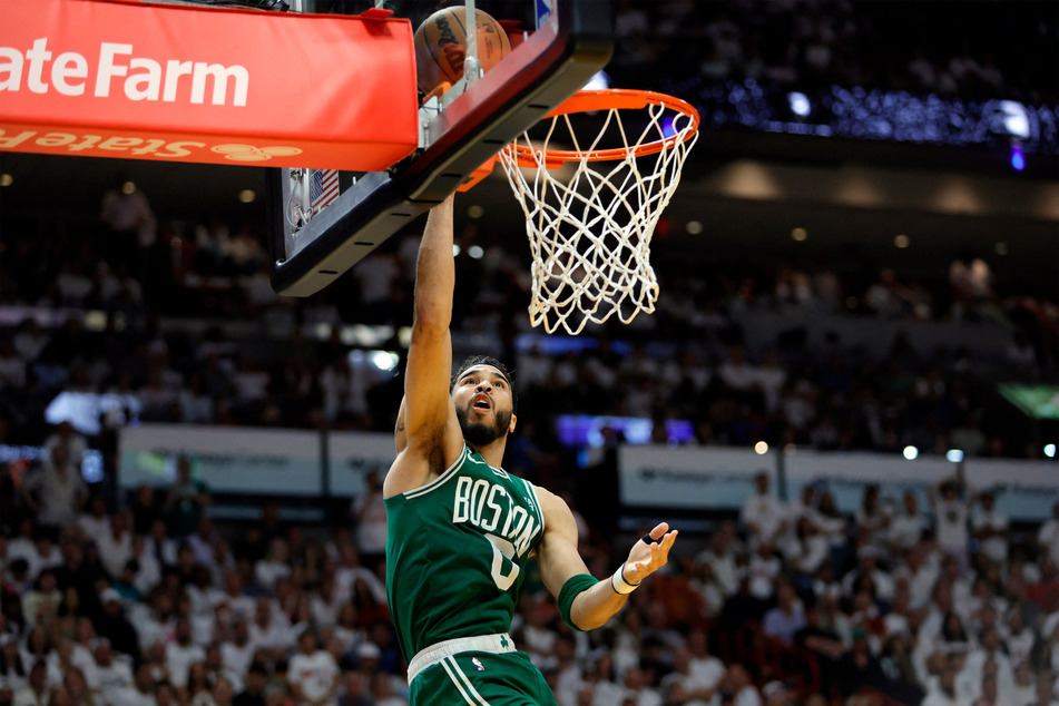 Celtics forward Jayson Tatum shoots against the Miami Heat in the fourth quarter during Game 6 of the Eastern Conference Finals for the 2023 NBA playoffs on Saturday.