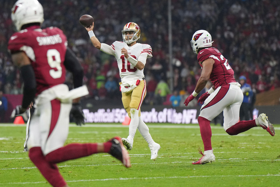 San Francisco 49ers quarterback Jimmy Garoppolo passes the ball against the Arizona Cardinals during the first half at Estadio Azteca in Mexico City.