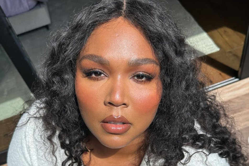 Lizzo emotionally vowed to keep creating "safe" spaces for plus-sized Black women amid her legal battles and explosive allegations.