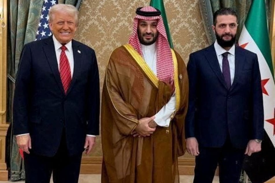 US President Donald Trump met with Saudi Arabia's Crown Prince Mohammed bin Salman (c.) and Syrian interim president Ahmed al-Sharaa (r.) on Wednesday.