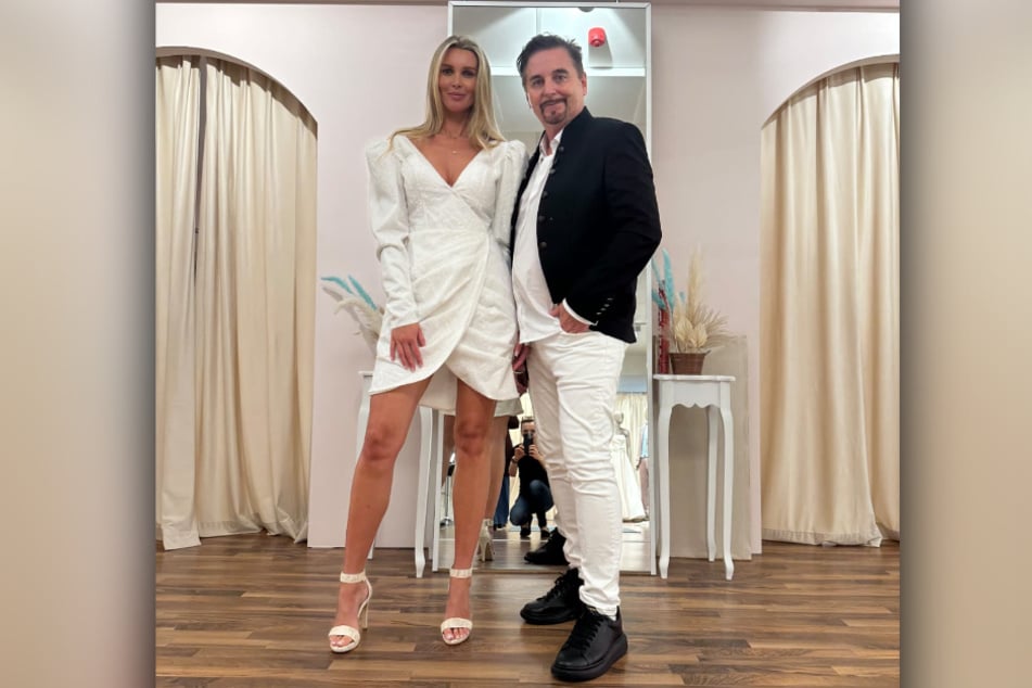 Katja Kühne (40) im schicken Partykleid neben ihrem "Einkleider des Vertrauens" Uwe Herrmann (62).