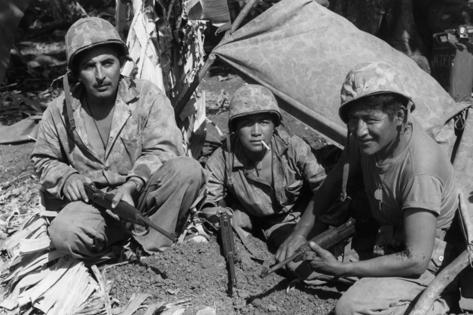 The history of Navajo "code talkers" recruited by the US Navy in 1942, including Carl Gorman (r.), were removed from the public record amid Trump's DEI purge.