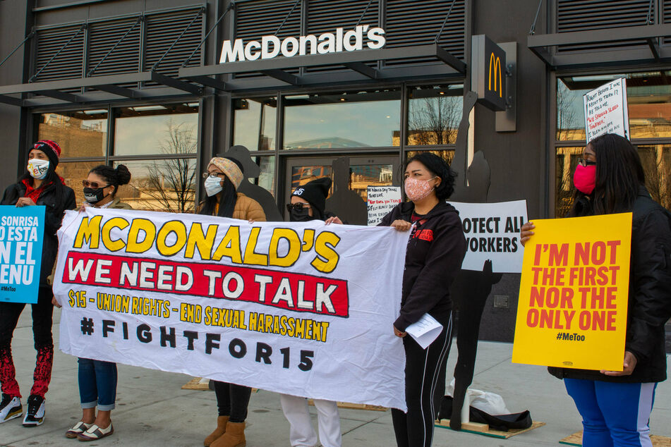 Protesters outside a McDonald's in Chicago join the call for a $15 minimum wage and an end to workplace sexual harassment.