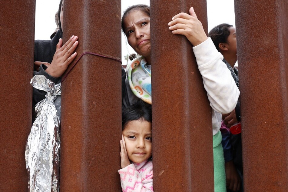 Biden administration's asylum ban at southern border allowed to stay in place – for now