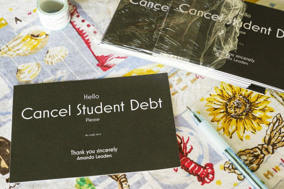 Amanda Leaders, a software developer and activist, has been sending postcards to the White House and to Florida state leaders, urging them to cancel student debt.