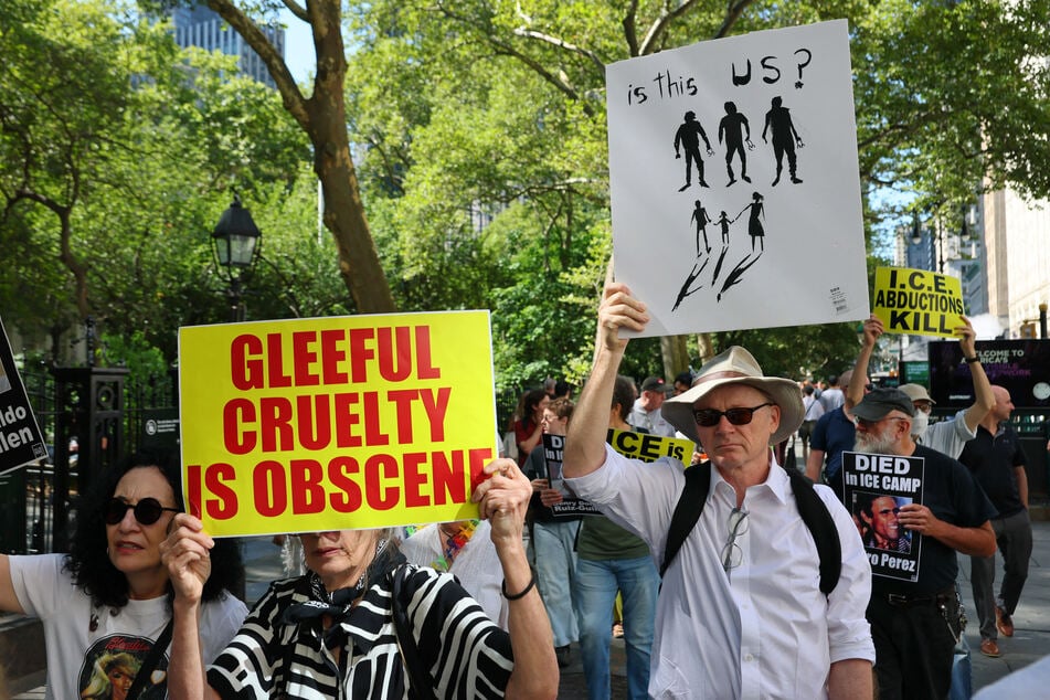 People march towards 26 Federal Plaza in New York City as they protest ICE on August 8, 2025.