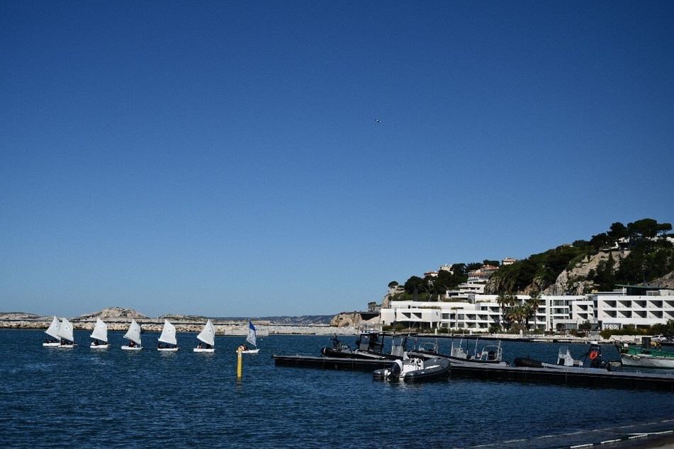 Dinghies float in the Marseille marina, which will be the sailing venue of the Paris Olympics.