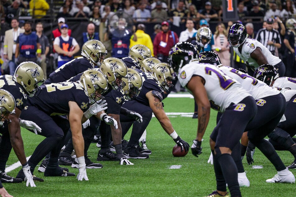 New Orleans Saints quarterback Andy Dalton looks over the Baltimore Ravens defense during the first half at Caesars Superdome.