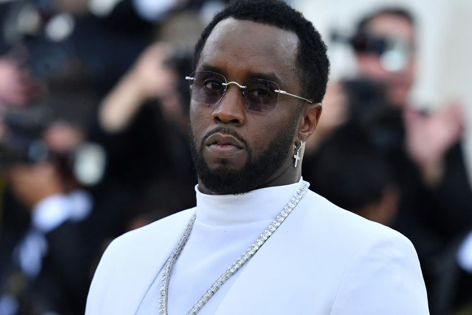 Sean "Diddy" Combs was charged with racketeering conspiracy and sex trafficking in an indictment unsealed on Tuesday.