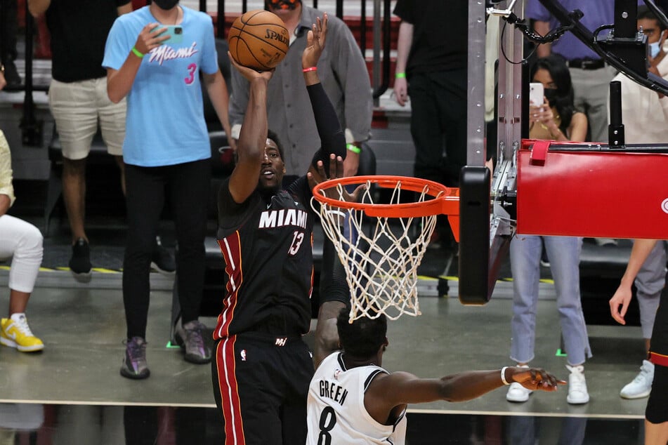 Miami Heat center Bam Adebayo hits the winning shot over Brooklyn Nets forward Jeff Green in the fourth quarter.