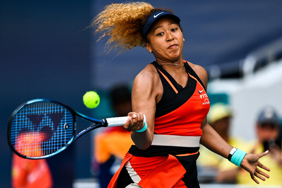 Naomi Osaka returns a shot during the women’s single finals at the 2022 Miami Open.