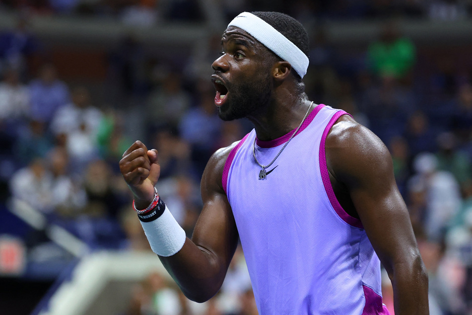 Frances Tiafoe reacts during his US Open quarter-final match against Bulgaria's Grigor Dimitrov.