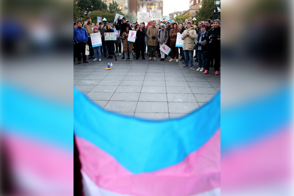 The transgender and gender-nonconforming flag held at a rally for LGBTQ+ rights in New York.