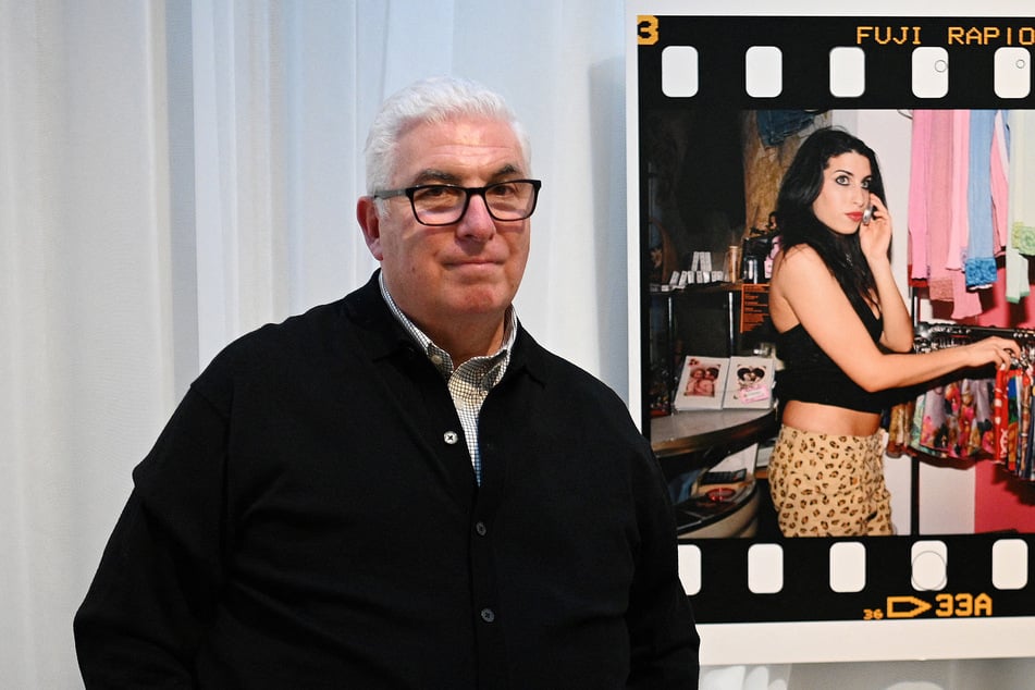 Mitch Winehouse must pay more than $1 million to her late daughter's friends after his unsuccessful lawsuit.