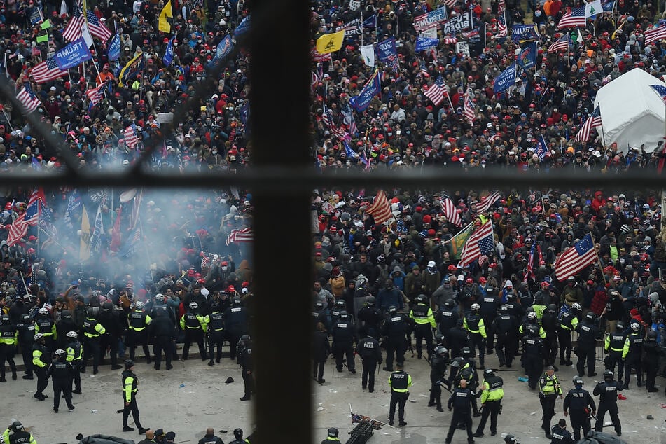 During the riot, Trump supporters attempted to breech security while Congress tallied votes for the 2020 presidential election Electoral Vote Certification.