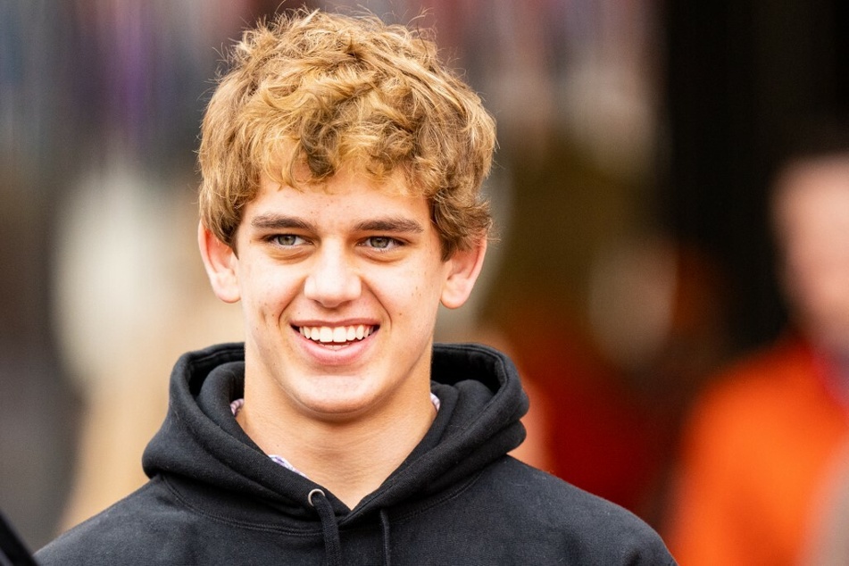 Arch Manning looks on during his recruiting visit to Clemson University.