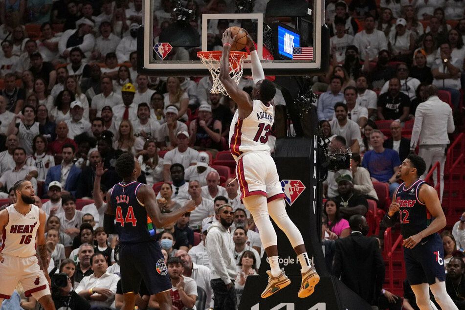 Heat center Bam Adebayo dunks on the Sixers as Miami edge closer to the West finals.