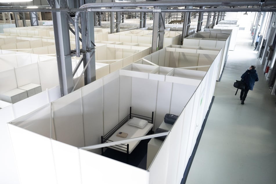 Viele Geflüchtete leiden unter den Bedingungen in Gemeinschaftsunterkünften. (Archivbild)