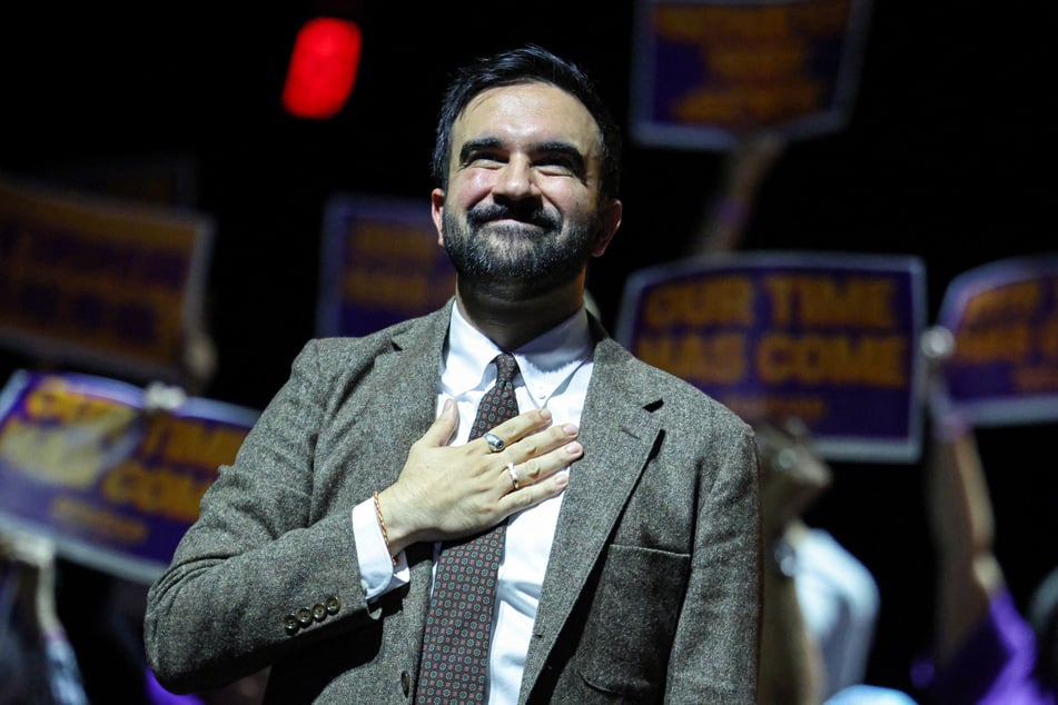 New York City Democratic mayoral candidate Zohran Mamdani gestures to the crowd during a "Our Time Has Come" rally in Washington Heights on Monday.