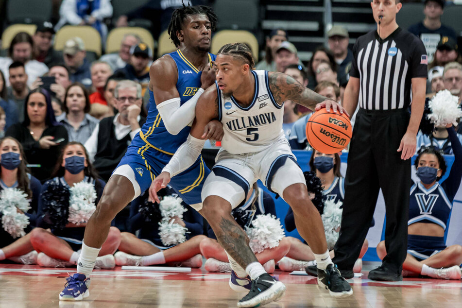 Villanova Wildcats guard Justin Moore (c) led his team with 21 points on Friday.