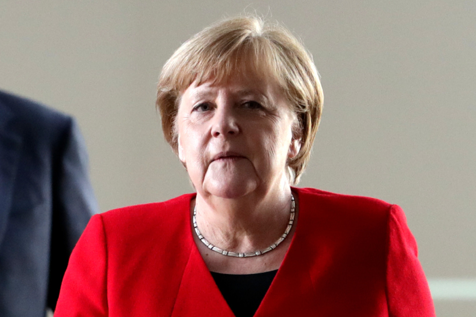 Merkel auf dem Weg zur PK.