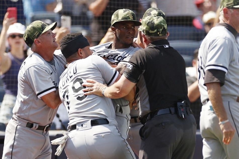 Tim Anderson was restrained during the fifth inning of the White Sox vs. Yankees game on Saturday.